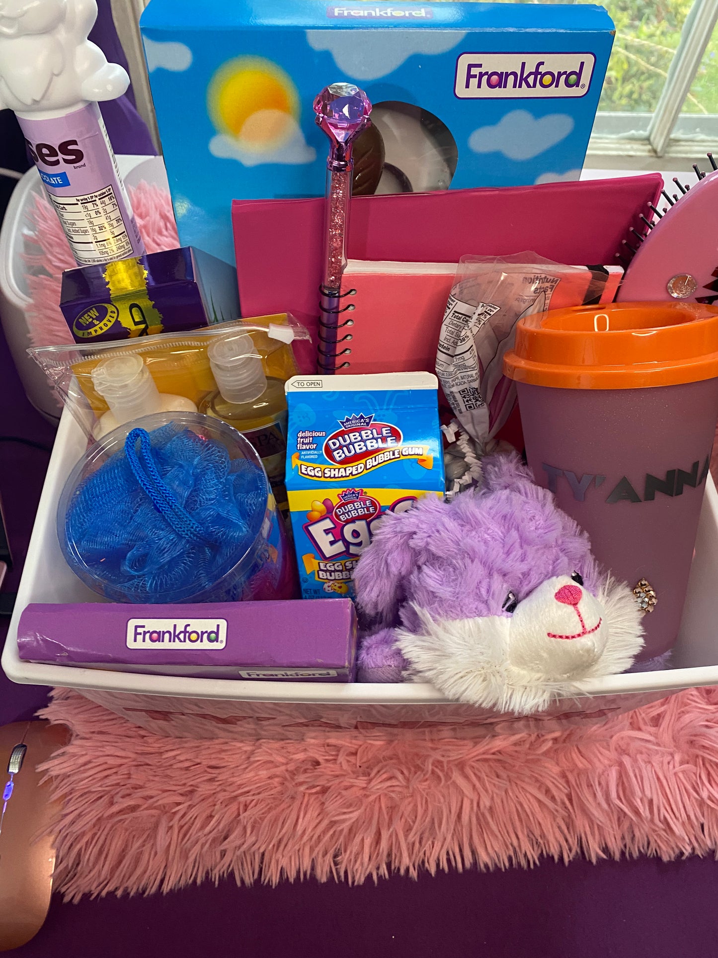 Personalized Teen basket with customized hair brush, teddy, candy, t-shirt, body lotion and shower gel, custom cup with name, notebook with name and weekly planner top view